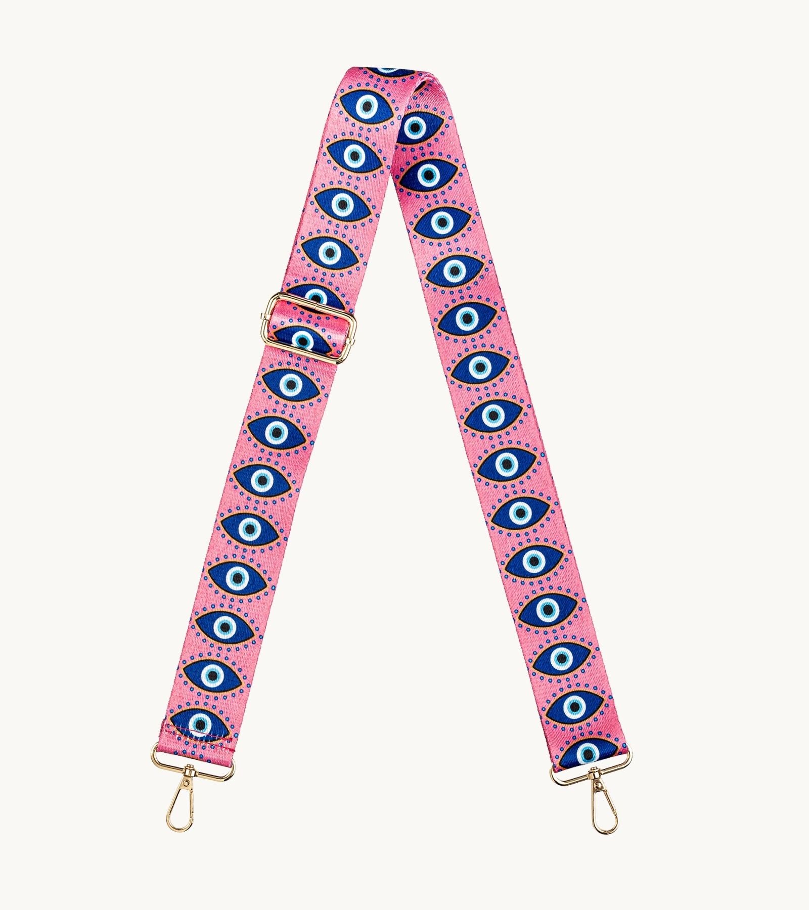 Crossbody popruh na mobil Strappy Art Evil Eye s motívom oka v ružovo-modrej farebnej kombinácii.