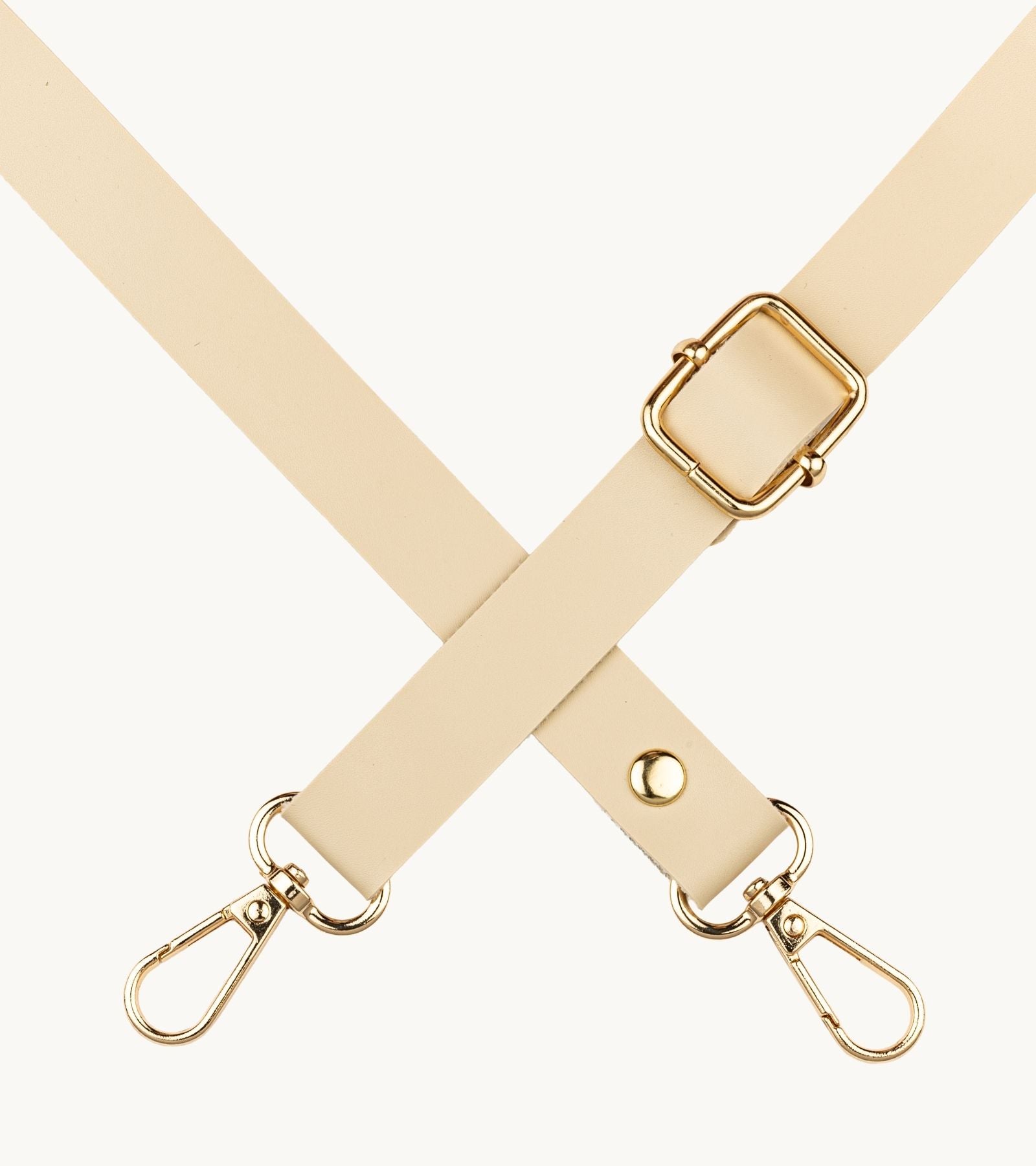 Detail koženého crossbody popruhu na mobil Strappy Leather Ivory Beige v svetlo béžovej farbe